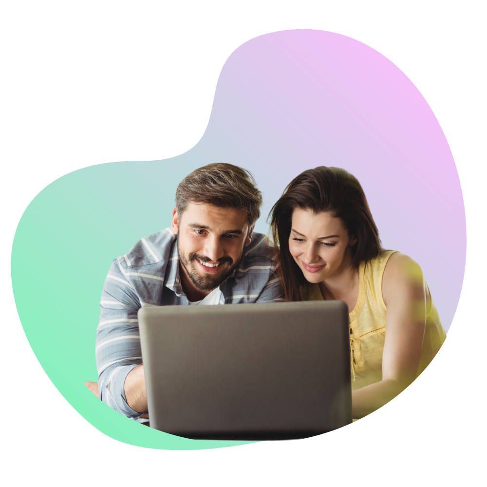 Two People look at a computer